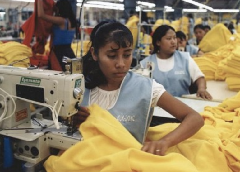 Image of workers in a clothing factory