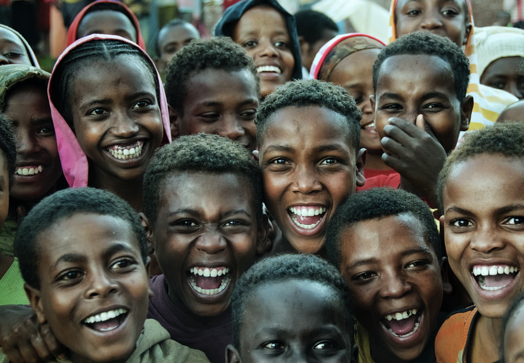 an image of African youth smiling.