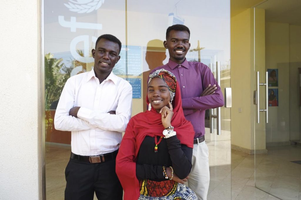 Image of three young people - two gentleman and a lady