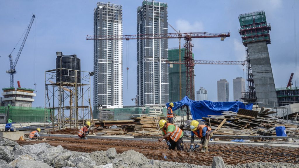 Construction workers working at development hotspots of China's "Belt & Road Initiative".