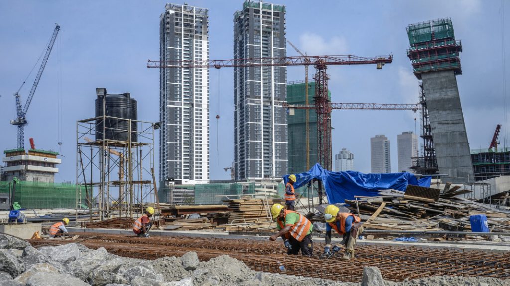 Construction workers working at development hotspots of China's "Belt & Road Initiative". 