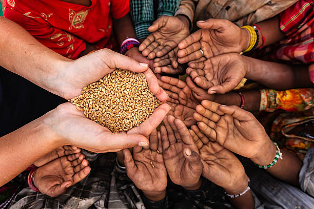 African children reaching out for food