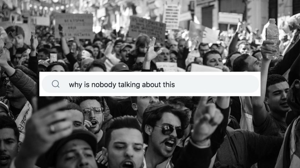 Black and white photo of a street protest with a search bar superimposed in the middle reading "why is nobody talking about this"