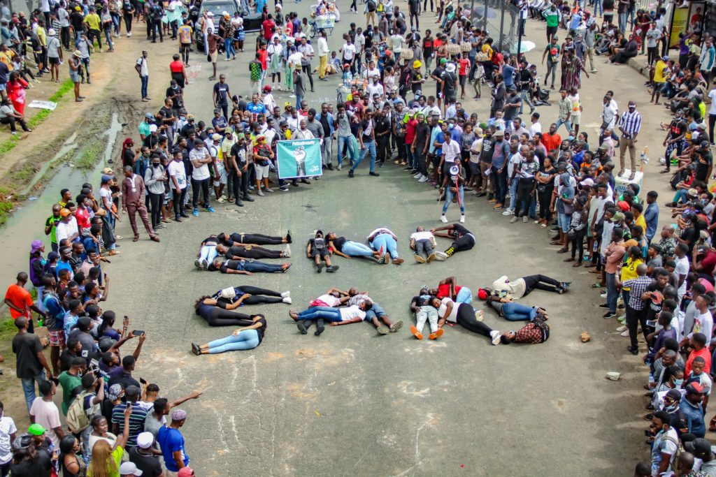 Protesters laid on the ground and used there bodies to spell 'ENDSARS'