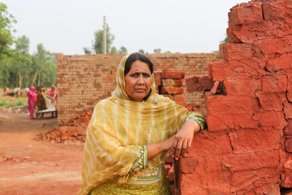 Syeda Ghulam Fatima looks at the viewer, her aged face does not reflect tiredness but an unshakeable determination to end bonded labour.