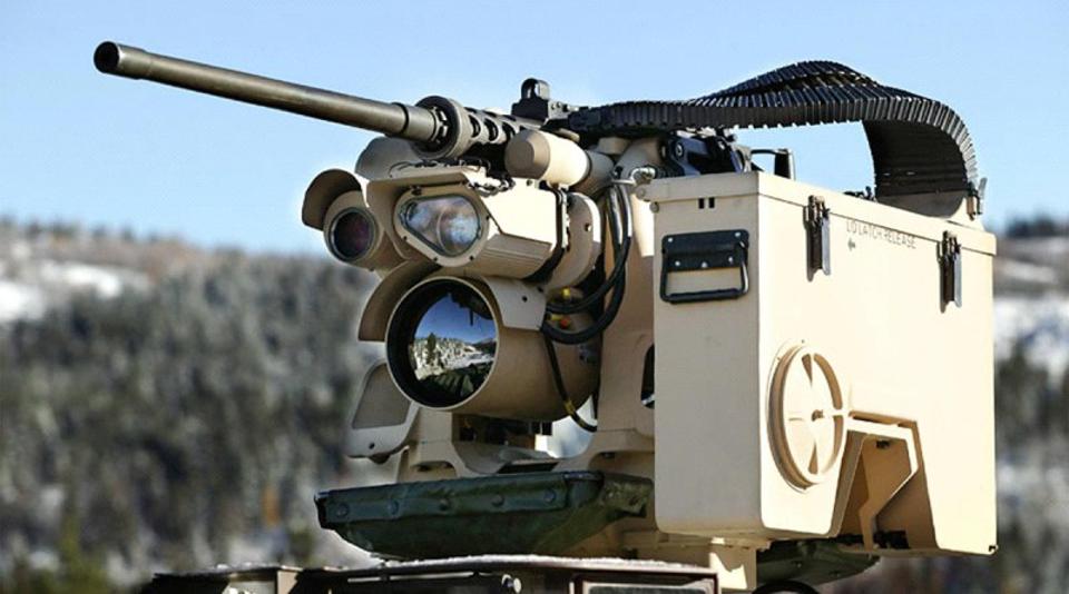 Picture of an remote controlled gun placed atop a vehicle