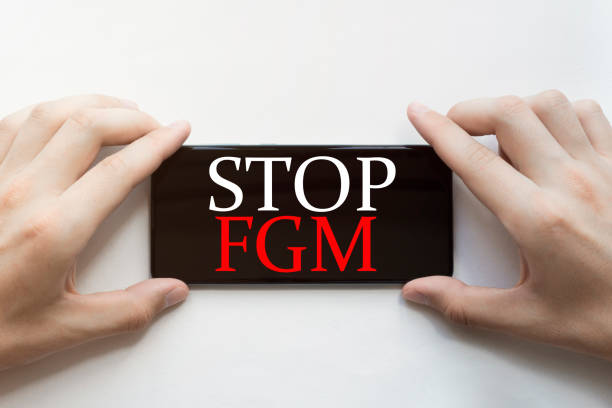 A write up with an inscription of "stop female genital mutilation"
