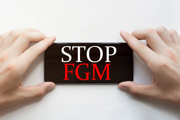 A write up with an inscription of "stop female genital mutilation" A write up with an inscription of "stop female genital mutilation"