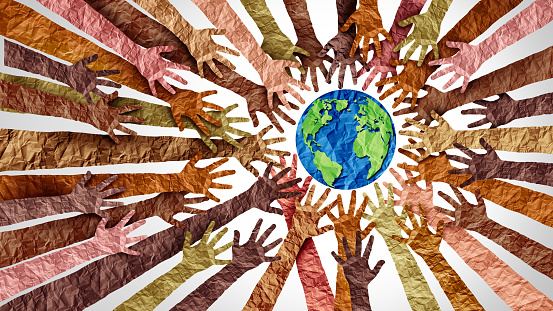 An image showing different races of people extending their hands to protect the environment