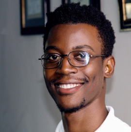 Tanu Kpedebah Headshot