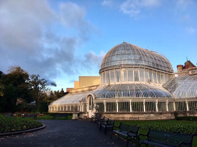 The photograph shows a beautiful autumnal day at the Botanic Gardens, in Belfast Northern Ireland. The sky is blue, with light clouds. The air is clear - or is it? Belfast has been found to have high levels of air pollution.