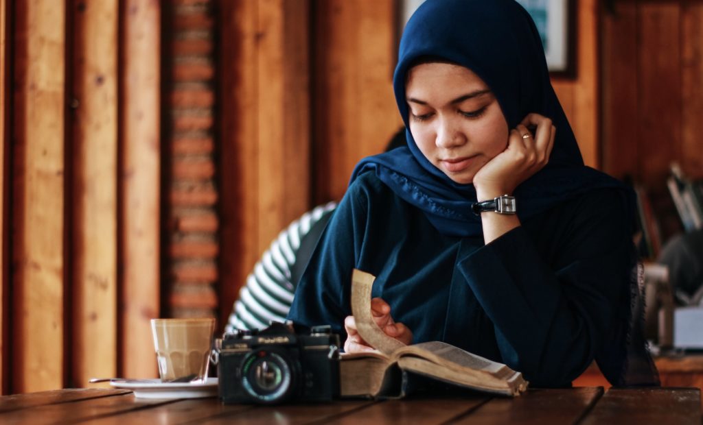 Girl with a Hijab studying