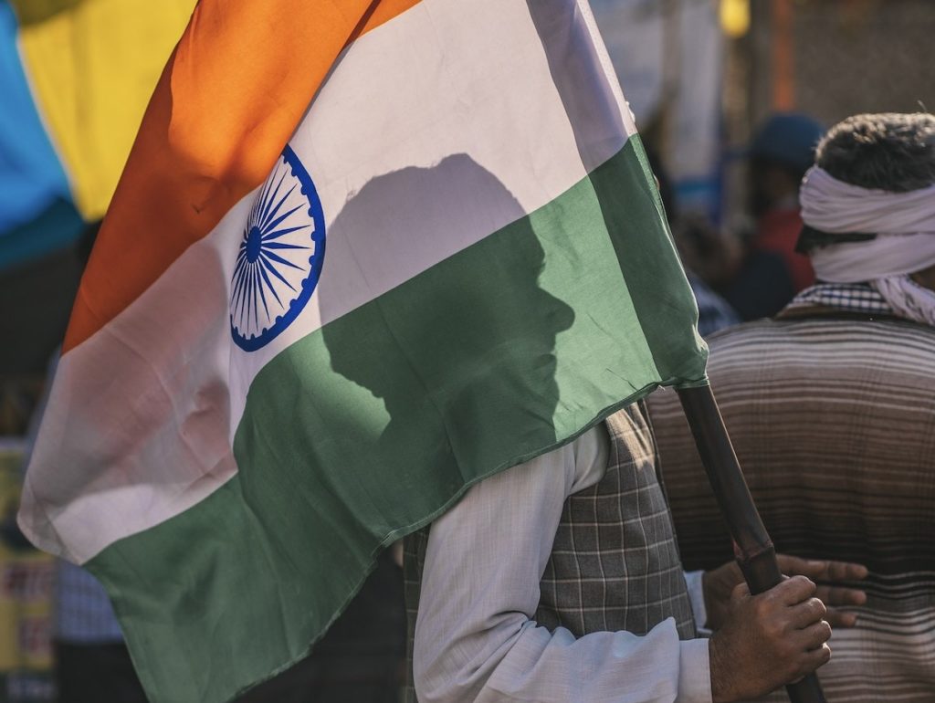 Silhouette of Indian man with a flag of India